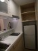 小型廚房設計將冰箱崁入